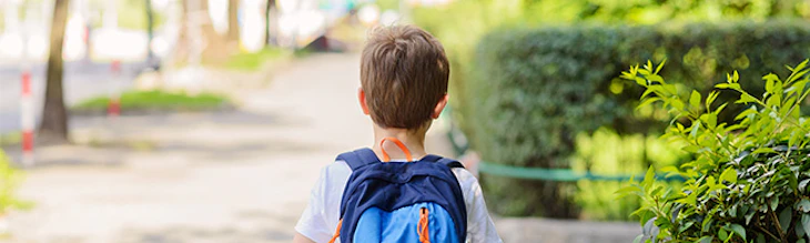 Boy Walking Home Alone