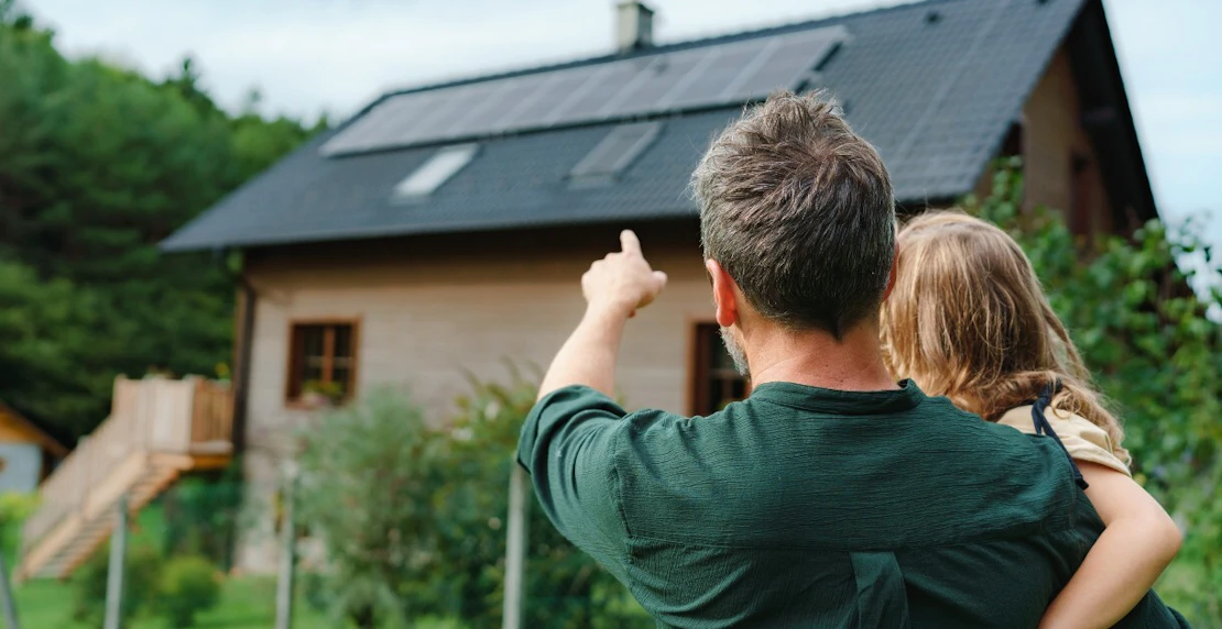 Man with child at rental property